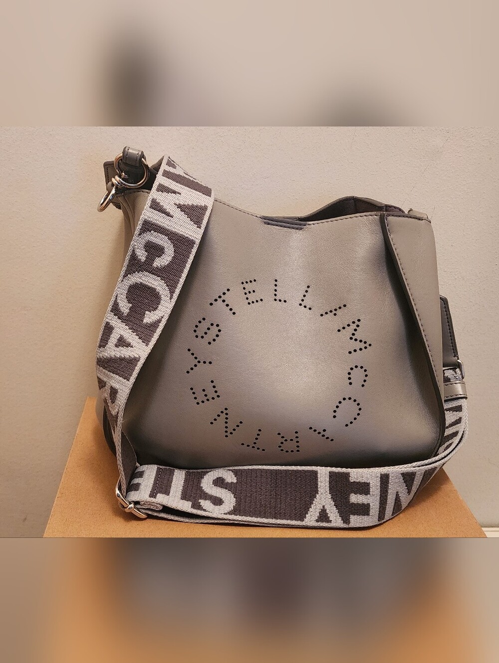 Stella McCartney Gray Perforated Logo Tote with Branded Strap And Dust Bag